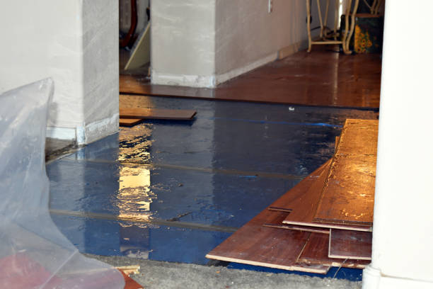 Professional Emergency Water Damage Restoration technician working in Ayer, MA